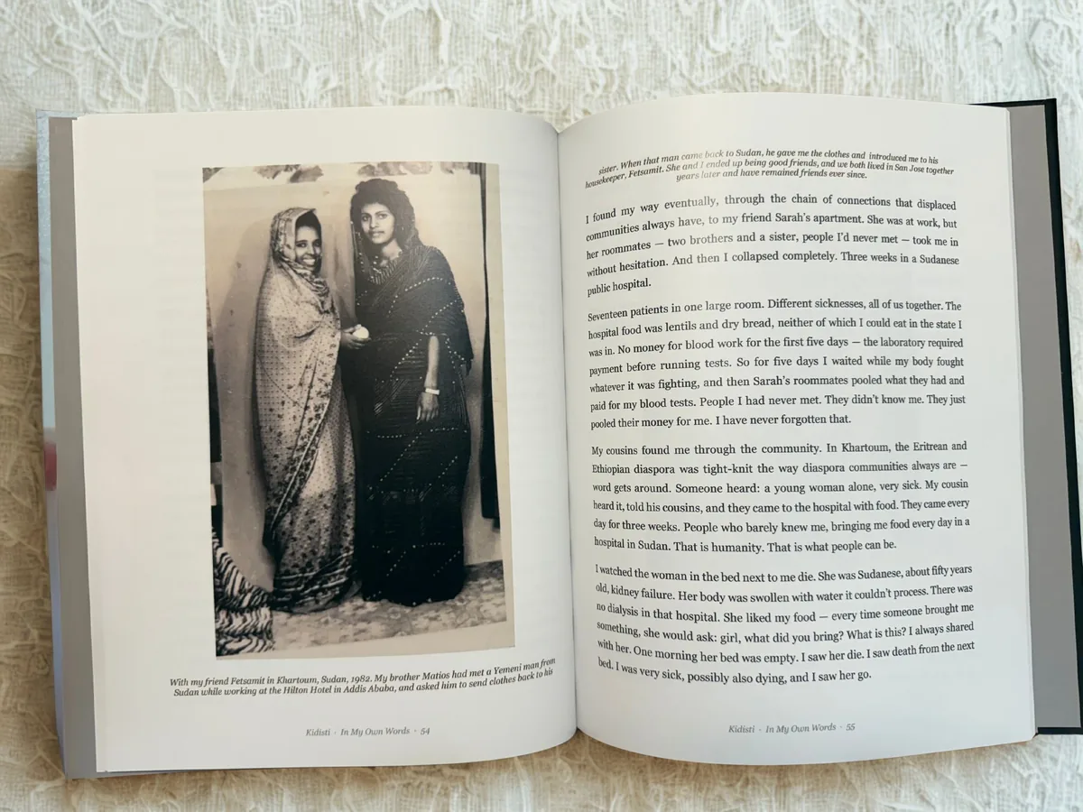 An open spread from Kidisti’s finished book, pages 54 and 55.